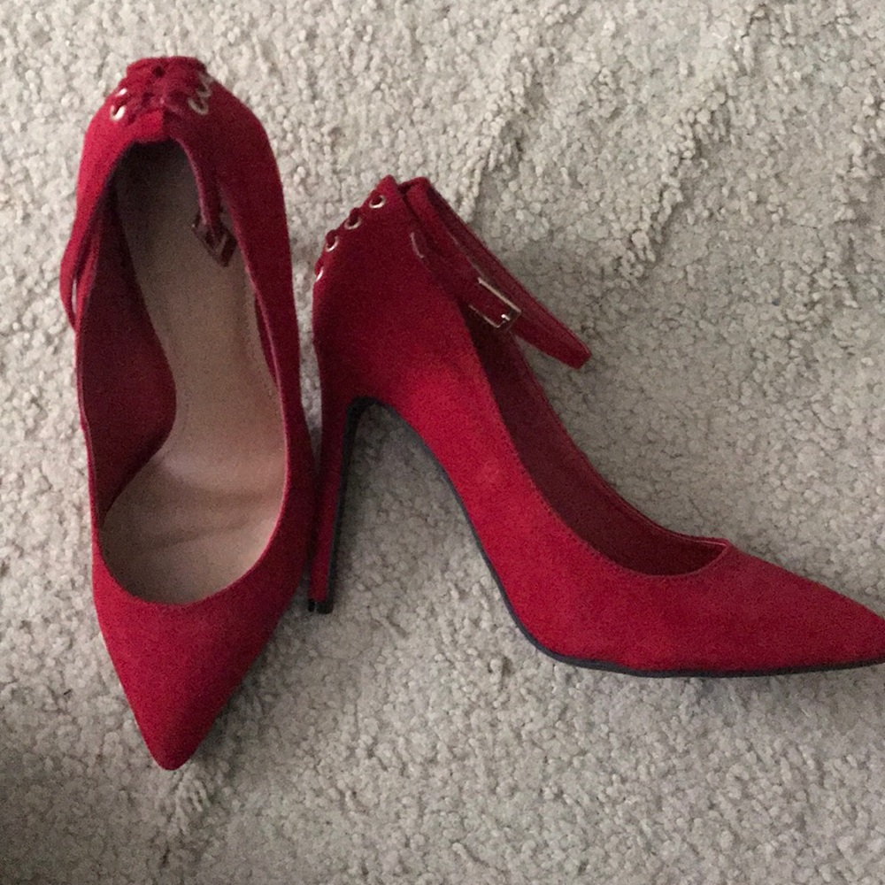 Red stilettos. Size 6, lightly worn, once